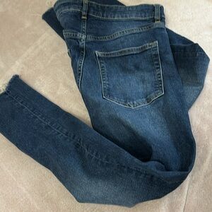 Jeans  five pocket design, zipper fly, slender leg fit